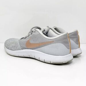 Nike Light Gray and White Shoes with Tan Swoosh